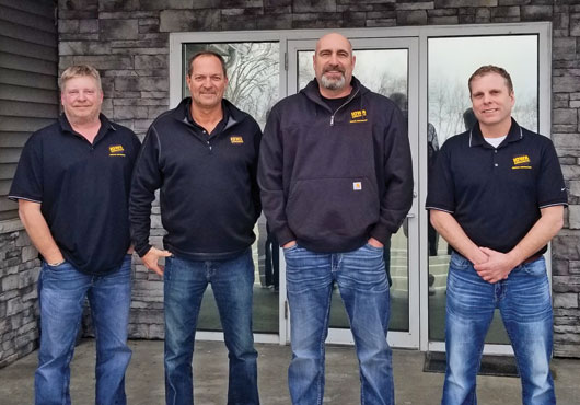 The management group at Iowa Concrete General Contractor includes (from left): Vice President of GC Operations Todd Kollross; Owners Mike Accola and Troy Zaruba; and Director of Design/Build Dean Dequaine.